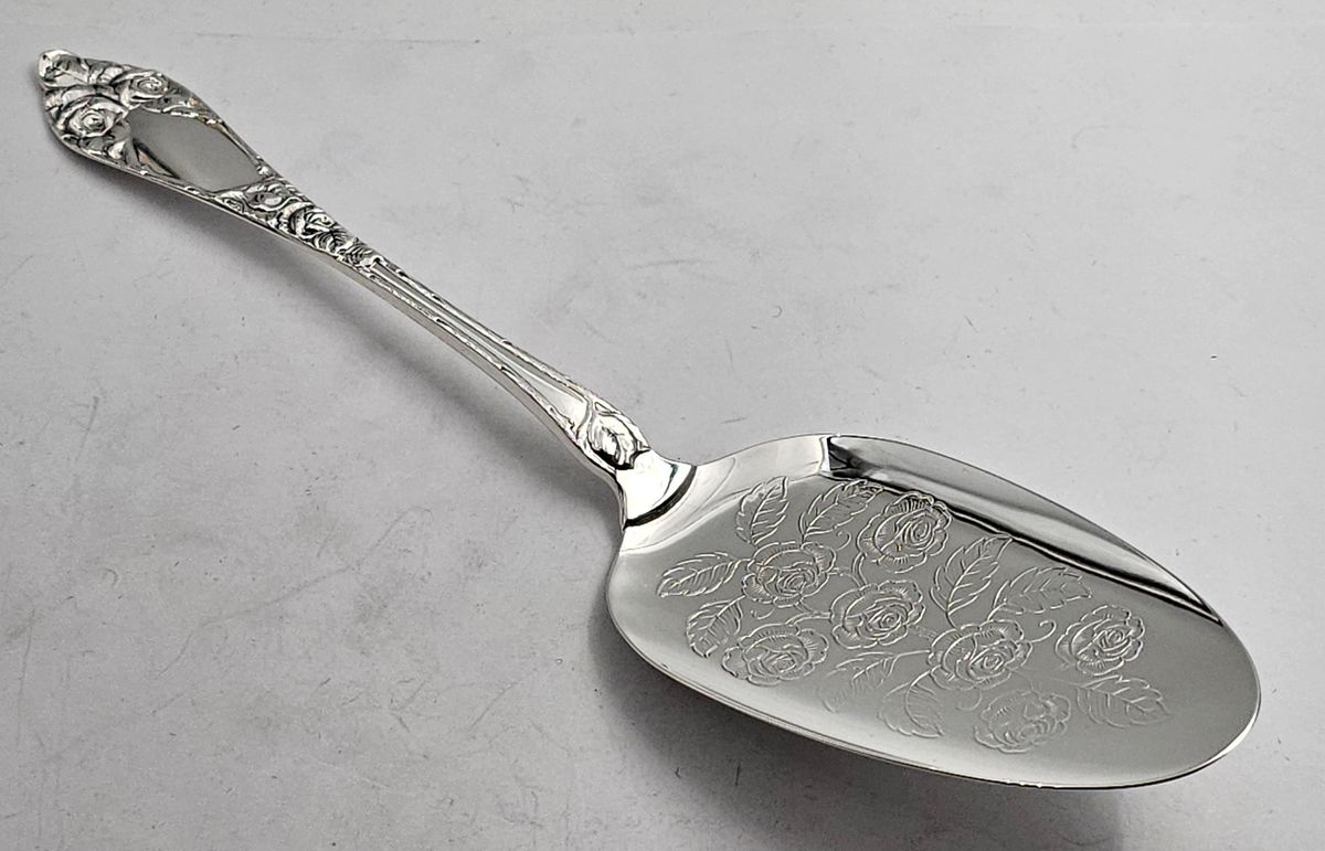 Opphøyd rose: Kakespade 21 cm (1)